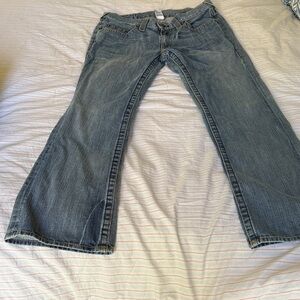 Vintage True Religion Flare men Jeans w/ leather logo cut on the back pockets